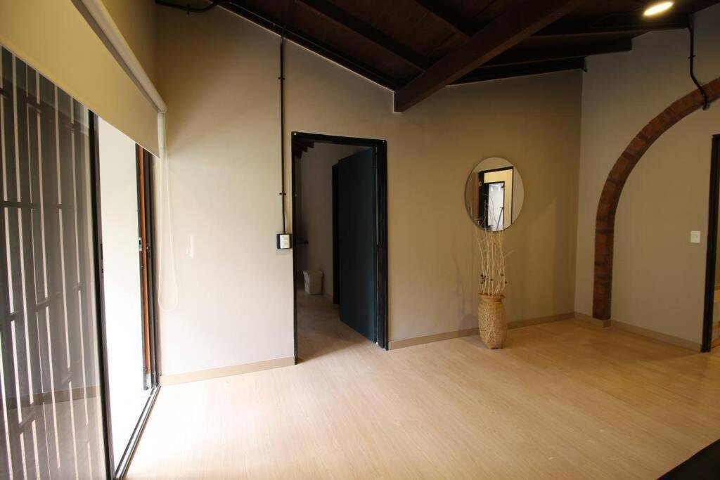 Cerca Unidad Deportiva Belen - One202 By Roots Apartment *